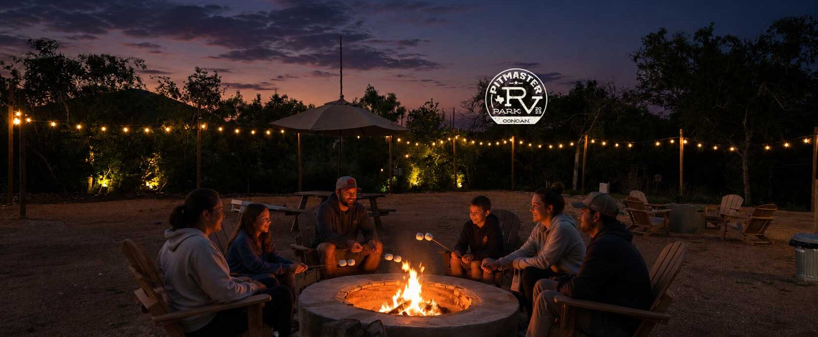 Friends gather around a circular campfire at night, roasting marshmallows under warm string lights in an outdoor patio setting.